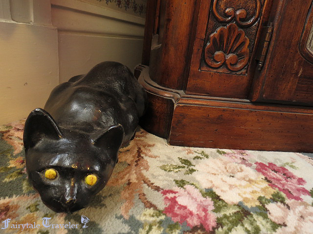 A weird black cat in the guest room where the murder of Abbey Borden occurred photo by Christa Thompson 