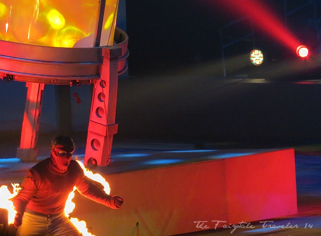 A performer on fire is part of the act.