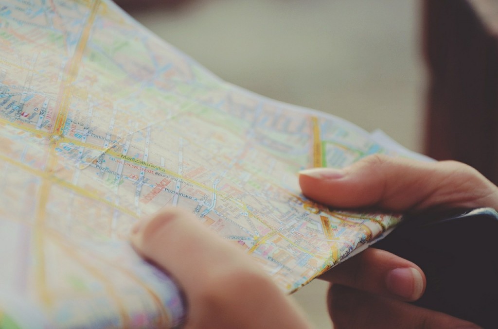 map, tourist, frugal road trip tips Navigating Public Transportation While Traveling