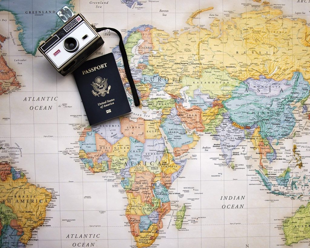 map, passport, best countries to study abroad, schoolwork while traveling