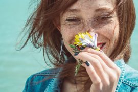genetic sensitivity to scent, girl smelling flower